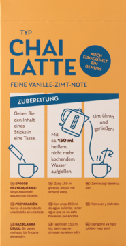 Tył opakowania Chai Latte o smaku waniliowo-cynamonowym. Pomarańczowe tło z niebieskimi instrukcjami przygotowania.
