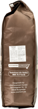 Tylne ujęcie brązowego opakowania kawy ziarnistej Rossmann z widocznym adresem producenta i numerem infolinii.