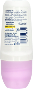 Tył antyperspirantu w kulce Rossmann 50ml, biała butelka z fioletową bazą, widoczne składniki i instrukcje.
