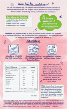 Tył różowo-białego opakowania Babydream BIO Musli dla niemowląt, z instrukcjami i tabelą wartości odżywczych.