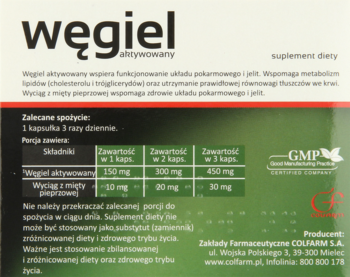 Suplement Węgiel Aktywowany: tył zielonego opakowania z tabelą dawek węgla i mięty pieprzowej dla trawienia.