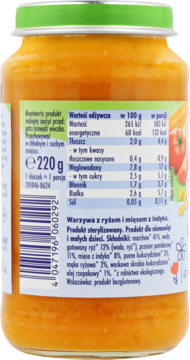 Tył słoiczka Babydream warzywa z ryżem i indykiem, pomarańczowe puree. Zielona nakrętka, etykieta ze składem i danymi żywieniowymi.