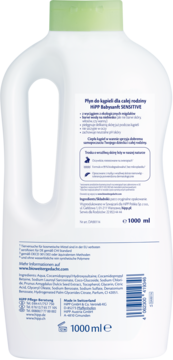 Tył białej butelki HiPP Babysanft Sensitive 1000 ml z zieloną nakrętką, widoczna pełna etykieta z polskim tekstem.