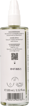 Tylna strona przezroczystej butelki olejku do masażu krocza Hagi z białym atomizerem, z etykietą, kodem kreskowym i QR.