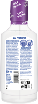 Tył białej butelki płynu do płukania jamy ustnej Jordan Gum Protector 500 ml, z fioletową nakrętką "EASY DOSING" i etykietą.