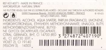 Tył opakowania perfum Kenzo, biała etykieta z listą składników, kodem kreskowym i napisem "Made in France".