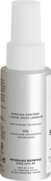 Tył białej butelki serum YOPE Blonde my hair. Etykieta z tekstem: Wzmacnia końcówki, chroni przed łamaniem, 99% naturalnych składników.