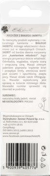 Tył opakowania masażera z białego jadeitu z różowozłotym metalem, z opisem i kodem kreskowym.