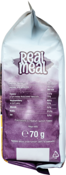 Tył fioletowo-białego opakowania Real Meal z wartościami odżywczymi i masą netto 70g. Widok pod kątem.