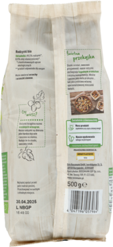 Tył białej torby z Rodzynkami Bączkiś bio, opisana jako słodka, owocowa przekąska, 500g netto, widoczny kod.