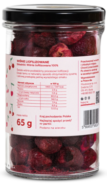Tył szklanego słoika z pomarszczonymi liofilizowanymi wiśniami 65g. Biała etykieta z opisem.