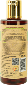 Tył brązowej butelki szamponu Sattva Ayurveda Shikakai, złota zakrętka, etykieta z polskim tekstem i składem.