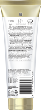 Tył złotobiałej tubki odżywki Pantene Pro-V Miracles z informacjami, listą składników i kodem EAN.
