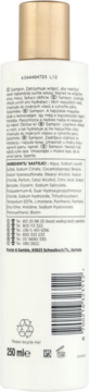 Tył białej butelki szamponu Pantene Hydra Glow, ze złotą zakrętką, z widocznym kodem kreskowym i składem.