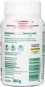 Tył białej butelki suplementu melatoniny w żelkach Rossmann, z zielonym tekstem i kodem kreskowym.