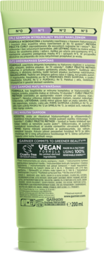Tył zielonej tubki szamponu Garnier Curls Method N°1 nawilżającego, z tekstami i logo Vegan.