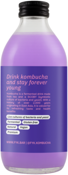 Tył butelki Kombucha Forever Young z lawendą i klitorią. Fioletowy napój, ciemna etykieta, czarna zakrętka.