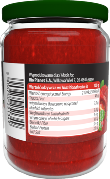 Tył szklanego słoika ekologicznego pesto z suszonych pomidorów Vitaliana, widoczna etykieta z wartościami odżywczymi.