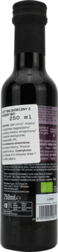 Tył ciemnej butelki octu balsamicznego z Modeny Bio 250 ml, biała etykieta, widoczny kod kreskowy.