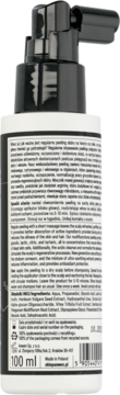 Peeling do skóry głowy w białej butelce z czarną pompką, tył z czytelnym opisem i składem.