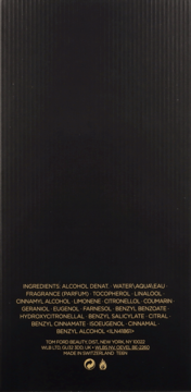 Tył czarnego, prążkowanego opakowania perfum Tom Ford Black Orchid, z białym tekstem listy składników.