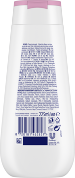 Tył białej butelki Dove Advanced Care Glowing Shower Gel z różowym dozownikiem, z kodem kreskowym i listą składników.