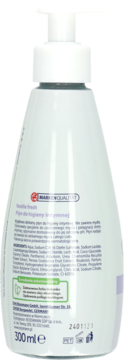 Tył białej butelki płynu do higieny intymnej Facelle Fresh z pompką, widoczna etykieta z napisami i pojemnością 300ml.