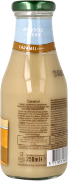 Tył szklanej butelki Starbucks Frappuccino Caramel No Added Sugar 250ml. Widoczne etykiety ze składem i danymi.