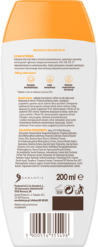 Tył opakowania białej butelki emulsji do opalania Kolastyna SPF 30, z listą składników i kodem kreskowym.