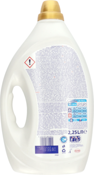 Tył białej butelki żelu Persil Deep Clean Sensitive 2,25L. Widoczna etykieta ze składem, instrukcjami i ostrzeżeniami.