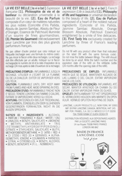 Tył opakowania Lancôme La Vie Est Belle Eau de Parfum. Biała etykieta z tekstem w wielu językach, listą składników.