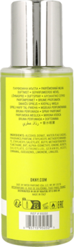 Tył butelki mgiełki do ciała DKNY Be Delicious, limonkowy płyn, srebrna nakrętka, etykieta ze składnikami.
