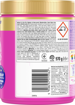 Vanish Oxi Action Pink odplamiacz, tył różowego opakowania 970g ze złotą pokrywką, biała etykieta z kodem kreskowym i ostrzeżeniami.