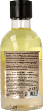 Tył przezroczystej butelki dwufazowego olejku Sandalwood 250 ml do kąpieli/prysznica, z czytelną etykietą.