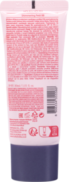 Holika Holika Shimmering Petit BB, tył różowej tubki z wielojęzycznym opisem i niebieską nakrętką.