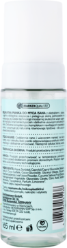 Tył przezroczystej butelki pianki Isana, 85 ml, z aloesem i micelami. Widoczna etykieta ze składem i logo Vegan.