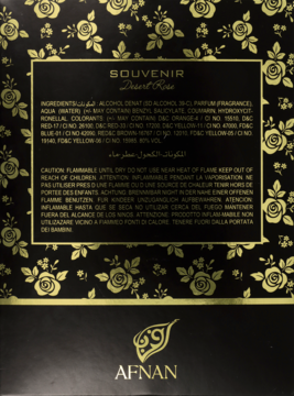 Tył czarnego opakowania perfum Souvenir Desert Rose Afnan. Widoczny skład i ostrzeżenia, złote róże na brzegach.