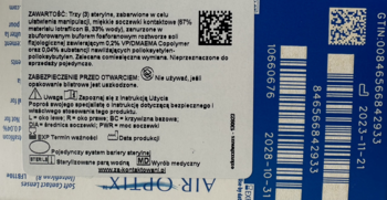Opakowanie miesięcznych soczewek Air Optix Plus HydraGlyde, zbliżenie na tył z kodem kreskowym i datą ważności.