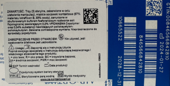 Tył opakowania soczewek Air Optix Plus HydraGlyde, biała etykieta z polskim tekstem, kodami, na niebieskim tle.