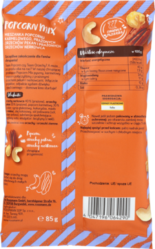 Tył pomarańczowego opakowania Genuss Plus Popcorn Mix z karmelowym popcornem i orzechami nerkowca. Widoczne dane odżywcze.