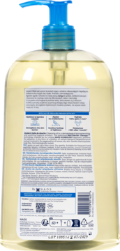 Tył butelki Atoderm Huile De Douche, kremowy olejek do mycia ciała, żółty płyn, niebieska pompka, etykieta.