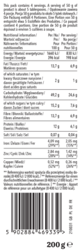 Tył opakowania musli 200g, etykieta z wartościami odżywczymi (energia, białko, tłuszcz) i kodem kreskowym.