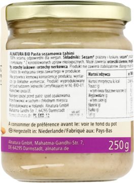 Alnatura Tahini, pasta sezamowa BIO, tył szklanego słoika z biało-fioletową etykietą, tekstem PL, 250g.