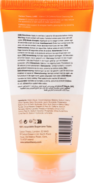 Tył pomarańczowo-białej tubki żelu do mycia twarzy Carbon Theory C i kofeina, widoczne instrukcje i skład.