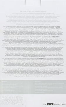 Białe opakowanie lusterka podróżnego TYLPRO On Tour Petite LED Travel Mirror, widok z góry, z opisami w wielu językach.