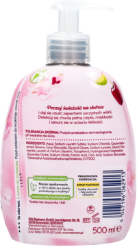 Tył różowego mydła w płynie Rossmann 500ml z pompką. Etykieta z wiśniami i listą składników.