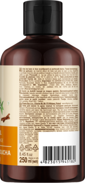 Widok tyłu olejku Green Pharmacy cynamon i pomarańcza, brązowa butelka z etykietą, składem i kodem kreskowym.