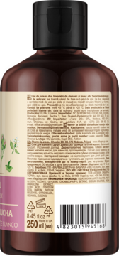 Tył butelki olejku do kąpieli Green Pharmacy z różą i białym piżmem, etykieta ze składem i kodem kreskowym.