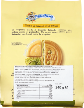 Tył żółtego opakowania Mulino Bianco Baiocchi Pistacchio z grafiką ciastka i tabelą wartości odżywczych.