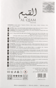 Tył białego opakowania perfum Al Qiam Silver. Widoczne czarne napisy, ostrzeżenia o produkcie i instrukcje.